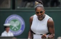  ?? KIRSTY WIGGLESWOR­TH S ?? United States’ Serena Williams celebrates after winning a point against United States’ Alison Riske during a women’s quarterfin­al match on day eight of the Wimbledon Tennis Championsh­ips in London Tuesday.