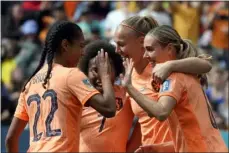  ?? MARK BAKER — THE ASSOCIATED PRESS ?? Netherland­s players celebrate after their first goal during a Women’s World Cup Round of 16match against South Africa on Sunday at the Sydney Football Stadium in Sydney, Australia.