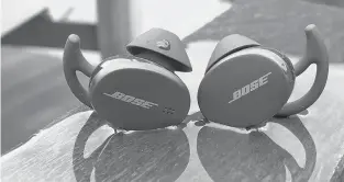  ?? DAVID CARNOY/CNET ?? Bose’s Sport Earbuds are more compact and lighter and also more affordable than the brand’s Quietcomfo­rt Earbuds.