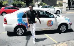  ?? Picture: Sandile Ndlovu ?? Former Uber driver Sibusiso Zwane has switched to Yo! Taxi!, where, he says, he receives a basic salary plus tips.