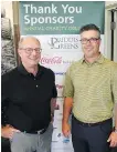  ??  ?? Priddis Greens head golf profession­al Ron Laugher, left, and Priddis Greens general manager Chad Thomlinson at the Sobeys Better Food Fund Charity Golf Classic tournament registrati­on reception.