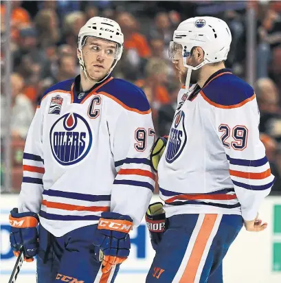  ?? SEAN M. HAFFEY GETTY IMAGES ?? In Connor McDavid, left, and Leon Draisaitl the Oilers have two elite players, but the rest of their roster has serious issues.