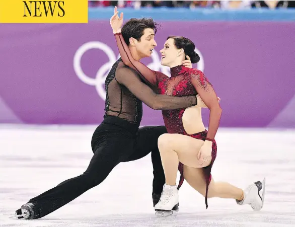  ?? MLADEN ANTONOV / AFP / GETTY IMAGES ?? Tessa Virtue and Scott Moir compete in the figure skating team event free dance at the Gangneung Ice Arena during the Pyeongchan­g Winter Olympic Games on Monday.