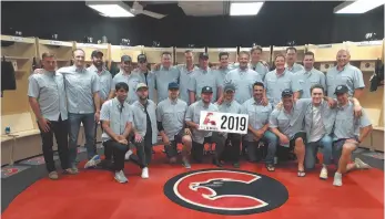  ?? CITIZEN STAFF PHOTO ?? Prince George Cougars alumni golfers involved in today’s Spirit of the North Healthcare hospital charity tournament got together for a photo in the Cougars’ dressing room at CN Centre before Friday’s auction dinner. Front row from left are Raymond Grewal, Josh Connolly, Eric Hunter, Cody Carlson, Jari Erricson, Tyler Brough, Shawn Gendron, Brogan O’Brien and Josh Curtis. Back row, Brett Parker, Nick Drazenovic, Evan Fuller, Ronald Petrovicky, Chase Witala, Chris Petersen, Dan Lapointe, Andrew Luciuk, Rob Voltera, Mike MacLean, Stew Malgunas, Eric Brewer, Dan Hamhuis and Kyle Stanton. Missing from photo: Ty Edmonds.