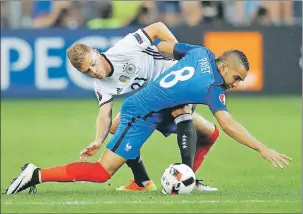  ?? AP PHOTO ?? France’s Dimitri Payet, right, and Germany’s Joshua Kimmich fight for the ball during the Euro 2016 semifinal soccer match between Germany and France, at the Velodrome stadium in Marseille, France, Thursday.