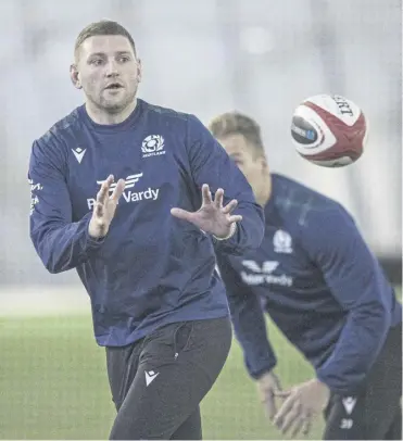  ?? ?? Finn Russell, main, has been named co-captain alongside Rory Darge. Being Scotland skipper seemed to affect the form of Jamie Ritchie, left