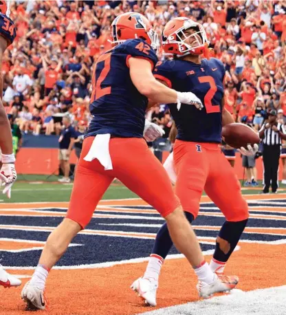  ?? JUSTIN CASTERLINE/GETTY IMAGES ?? Freshman Matthew Bailey (2) scored the Illini’s first touchdown by recovering a muffed punt in the end zone.