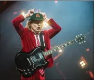  ?? (AP file/Amy Harris/Invision) ?? Angus Young and the rest of the venerable rock band AC/DC are on a roll in 2020, releasing their 17th studio album “Power Up,” to good reviews from critics. The band has been together 47 years.