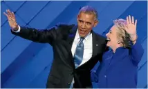  ?? PHOTO: REUTERS ?? Hillary Clinton joins Barack Obama on stage after his speech at the Democratic National Convention in Philadelph­ia.
