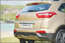  ??  ?? Top: Hyundai Creta (front view), Above: Hyundai Creta (rear view), Below: Interior view of Hyundai Creta