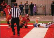  ?? DAVID TURBEN — THE NEWS-HERALD ?? Perry defensive back Jacob Allen makes an intercepti­on against NDCL in a 2016 Division IV regional final. Allen and the Pirates are the team to beat in the CVC Chagrin, while the Lions are among the teams to watch in a tough North Coast League Blue...