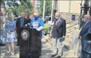  ?? MICHAEL GWIZDALA — MEDIANEWS GROUP ?? President of NALC Branch 358/Legislativ­e Director NYS Assn of Letter Carriers, William “Bill” Cook speaks at the post office on Broadway in Troy, Monday morning. Also attending the gathering were U.S. Sen. Kirsten Gillibrand, Troy Mayor Patrick Madden, U.S. Rep. Paul Tonko and U.S. Senate Minority Leader Chuck Schumer.