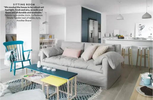  ??  ?? SITTING ROOM
‘We needed the house to be robust yet feel light, fresh and airy, so walls and floors are all durable and washable.’ Fatonia rug is similar, £270, La Redoute. Strada Tavolini nest of tables, £375, Another Brand