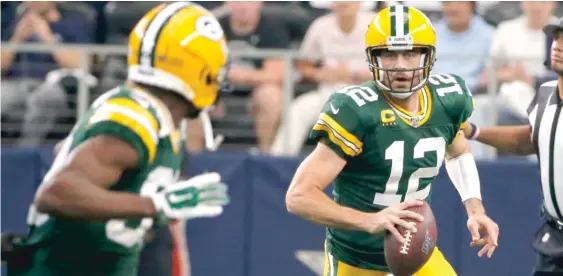  ?? AP ?? Packers QB Aaron Rodgers is only 7-8 on ‘‘Monday Night Football,’’ but he says it’s always a special thing. He will be without his top target, Davante Adams, against the Lions.