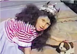  ?? Picture: SPLASH ?? Young Meghan dons a crown (and is that a corgi she’s stroking?)