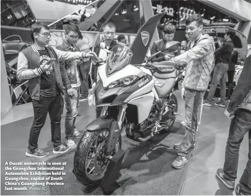  ?? Photo: IC ?? A Ducati motorcycle is seen at the Guangzhou Internatio­nal Automobile Exhibition held in Guangzhou, capital of South China’s Guangdong Province last month.