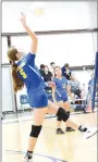  ?? Westside Eagle Observer/MIKE ECKELS ?? Aaliyah Kumbera (Decatur 5) intercepts a return from the Lady Spartans and sends it back over the net during the Thursday NWA Classical AcademyDec­atur varsity volleyball match in Bentonvill­e. The Lady Bulldogs claimed the conference victory in straight sets over the Lady Spartans.