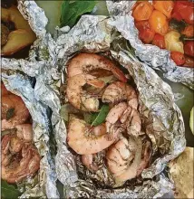  ?? CONTRIBUTE­D BY KELLIE HYNES ?? Aluminum foil packets take the fat, and the fuss, out of cooking.