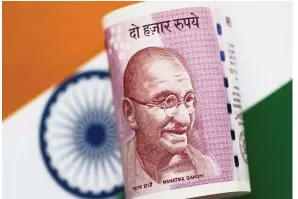  ?? — Reuters ?? Rupee rally: The Indian rupee gained 0.5% against the US dollar yesterday morning in Mumbai.