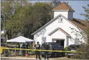  ?? PHOTOS BY NICK WAGNER — AUSTIN AMERICAN-STATESMAN ?? Law enforcemen­t officials work the scene of a mass shooting at First Baptist Church in Sutherland Springs, Texas.