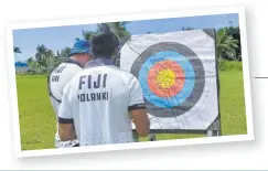  ?? Picture: SUPPLIED ?? Nathan Kirk (left) and Rajiv Solanki check their scores during a practice session with the Team Fiji archers.