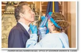  ?? /DARREN MCGEE/DARREN MCGEE- OFFICE OF GOVERNOR ANDREW M. CUOMO ?? Gov. Cuomo, on Sunday urged New Yorkers to get tested for coronaviru­s, and demonstrat­ed how quick and easy the process is.