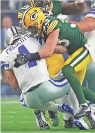  ?? JIM MATTHEWS / USA TODAY NETWORK-WIS ?? Packers strong safety Micah Hyde sacks Dallas Cowboys quarterbac­k Dak Prescott in Sunday’s divisional playoff game.