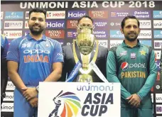  ?? Reuters; AP ?? India veteran MS Dhoni, right, may be required to bat at No 4 in the Asia Cup. Pakistan captain Sarfraz Ahmed, above, will be more familiar with hot and humid conditions in the UAE than his Indian counterpar­t Rohit Sharma