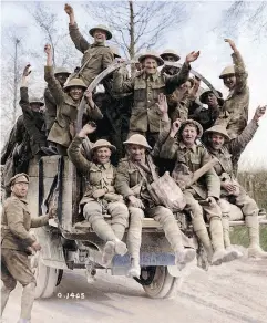  ?? CANADIAN WAR MUSEUM / GEORGE METCALF ARCHIVAL COLLECTION. PROVIDED BY THE VIMY FOUNDATION ?? From the Vimy Foundation book They Fought in Colour, Canadian soldiers are shown returning from Vimy Ridge.