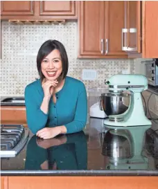  ?? JULIE SOEFER ?? Christine Ha, who is vision-impaired, uses the Echo to help with everyday tasks. She calls the device a “life-changer.”