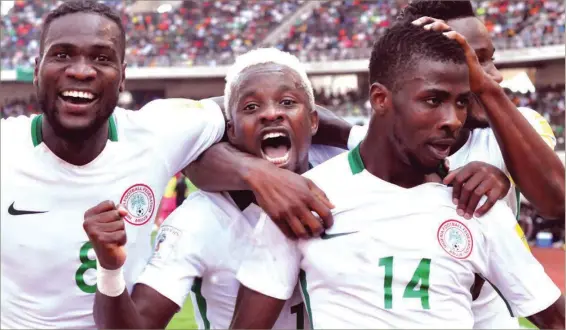  ??  ?? Super Eagles celebratin­g the 2-1 victory against Zambia in the 2018 World Cup qualifier in Ndola … last year