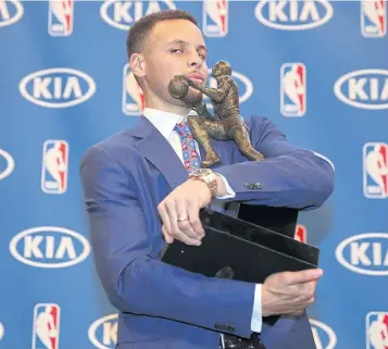  ?? AFP ?? Stephen Curry of the Golden State Warriors poses with his NBA Most Valuable Player trophy.