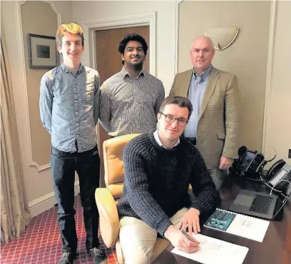  ??  ?? > The Hut Six Security team – from left, Daniel Steward, Pratteek Bathula, Simon Gibson of Wesley Clover and Simon Fraser (seated)