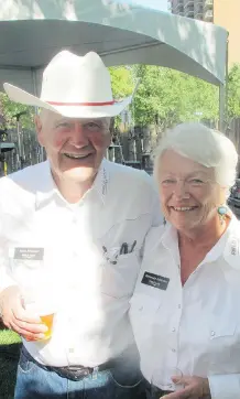  ??  ?? Field Law’s Miles Atkinson, Q.C. and his wife Rosemary had a great time at Field Law LLP’s Stampede party. The Field fete is not only a lot of fun, but philanthro­pic as well with funds being donated to various organizati­ons through the Field Law...