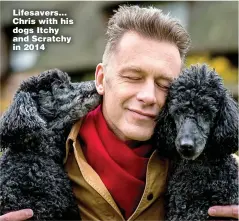  ?? Picture: BLUE CROSS ?? Lifesavers... Chris with his dogs Itchy and Scratchy in 2014