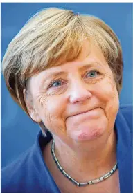  ?? FOTO: KAPPELER/DPA ?? Hätte besser laufen können: CDU-Kanzlerin Angela Merkel gerät durch die Siege der beiden Herren unter Druck.