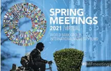  ?? Picture: Samuel Corum/Bloomberg ?? The IMF says the global economy is recovering faster than expected from the Covid-19 crisis, but warns that a spike in interest rates could be especially painful for emerging economies.