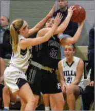  ?? BARRY TAGLIEBER - FOR MEDIANEWS GROUP ?? Villa Maria’s Maddy Ryan, left, plays tight defense on Phoenixvil­le’s Sammy Brown on Feb. 19..