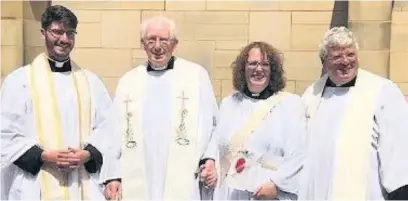  ??  ?? ●●The Rev Anne Gilbert with (left to right) nephew the Rev Sean Gilbert, her father, the Rev Fred Gilbert and her brother, the Rev Canon Mark Gilbert