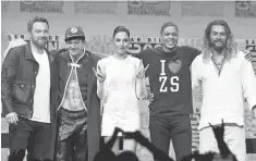  ?? KEVIN WINTER, GETTY IMAGES ?? Marvel didn’t take up all the limelight. Justice League stars Ben Affleck, left, Ezra Miller, Gal Gadot, Ray Fisher and Jason Momoa also thrilled fans.