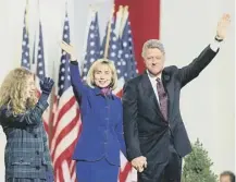  ??  ?? 0 Bill Clinton, wife Hillary and daughter Chelsea on this day in 1992 as projection­s said he would he be US president