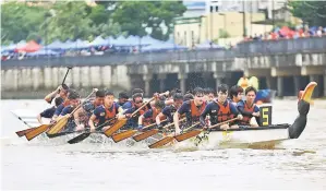  ??  ?? Some of the action at Kuching Waterfront yesterday.