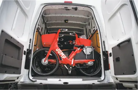  ?? Nicole Boliaux / The Chronicle ?? Jump-branded electric bicycles are unloaded at Social Bicycles’ office in San Francisco’s Bayview for an e-bike-sharing program.