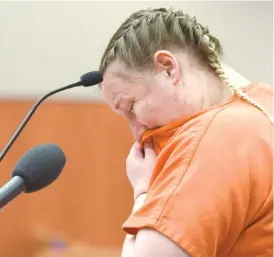  ?? JOHN STARKS/DAILY HERALD VIA AP ?? JoAnn Cunningham cries as she reads a statement Thursday during her sentencing hearing. Cunningham pleaded guilty in December to killing her 5-year-old son, Andrew “AJ” Freund.