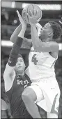  ?? NWA Democrat-Gazette/BEN GOFF Arkansas ?? senior guard Daryl Macon goes up for a shot against Butler’s Nate Fowler during Friday’s game in Detroit. The Razorbacks’ season ended Friday with a 79-62 loss to the Bulldogs.