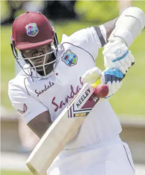  ?? (Photo: AFP) ?? West Indies’ Alzarri Joseph plays a shot on the fourth day of the first Test cricket match between New Zealand and West Indies at Seddon Park in Hamilton on Sunday.