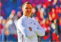  ?? AP FILE PHOTO/ VASHA HUNT ?? Alabama offensive coordinato­r Steve Sarkisian will be leading the Crimson Tide at the athletic facility and the practice fields while head coach Nick Saban works from home.