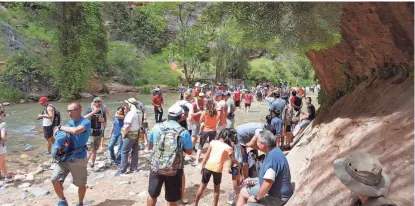  ?? ZION NATIONAL PARK VIA AP ?? Zion National Park in Utah is crowded in May of last year. The park is considerin­g requiring reservatio­ns to get in as a way of managing an overwhelmi­ng surge of visitors.