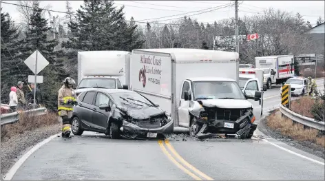  ?? KATHY JOHNSON ?? Emergency personnel attended to the Dec. 21 accident scene near Doctor’s Cove.