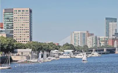  ?? STAFF PHOTOS By STuART CAHILL ?? SHIP’S COME IN: The Charles River Yacht Club, located next to the MIT Sailing Pavilion at left, and the Charlesgat­e Yacht Club, below, are among 21 private yacht and boat clubs that would see their annual rent payments to the state slashed under the...